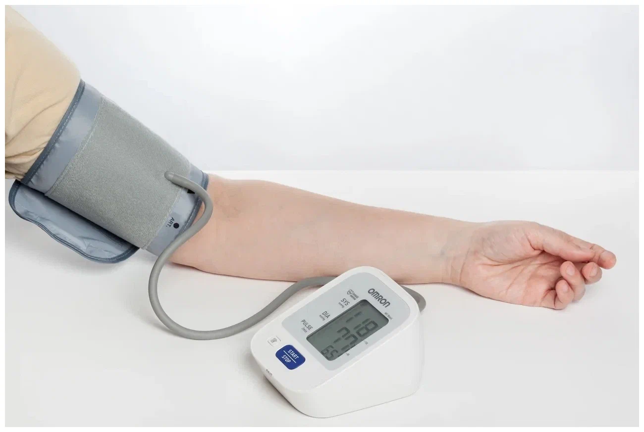 Person using a blood pressure monitor